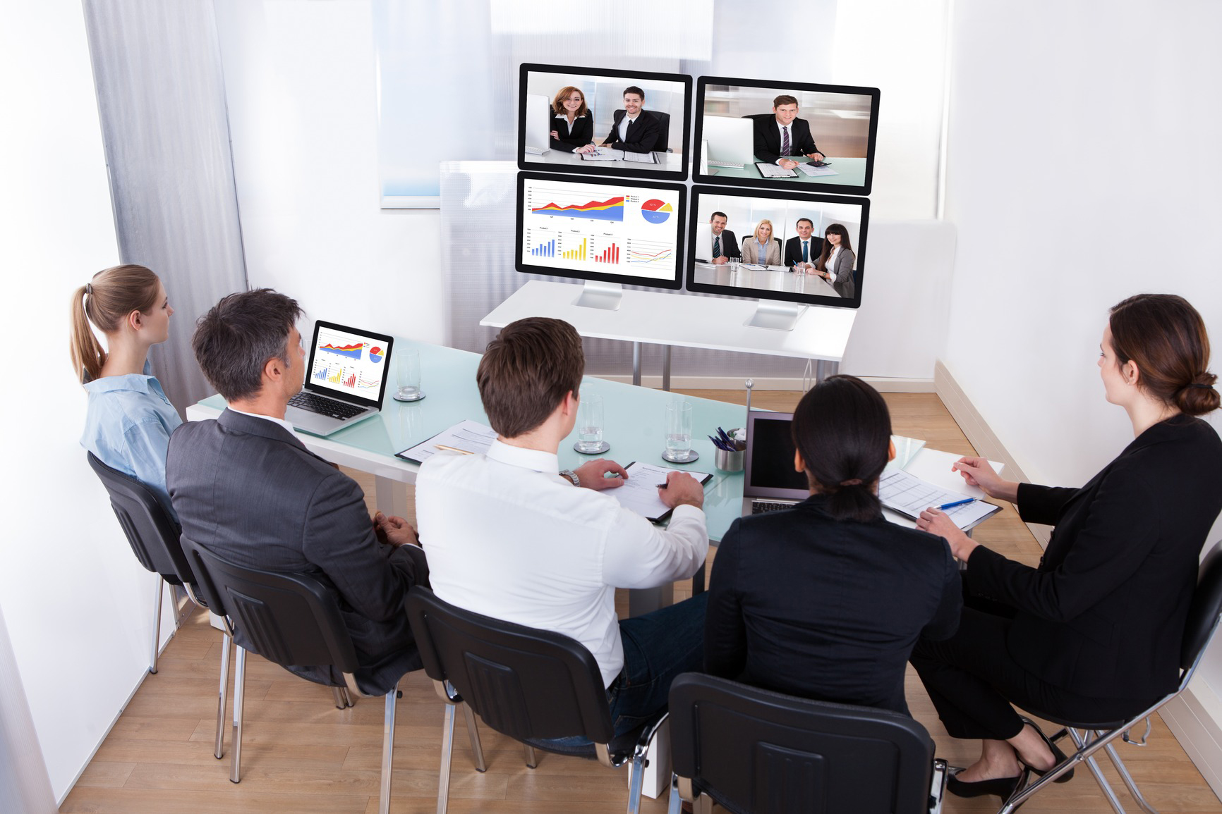 Group Of Businesspeople In Video Conference